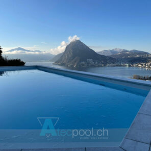 piscina in cemento armato con vista sul lago di lugano