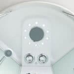 Lettino termale con rivestimento bianco e dotazioni di idromassaggio.