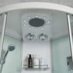 Doccia spa con pannelli di vetro e comandi digitali, ideale per il wellness.