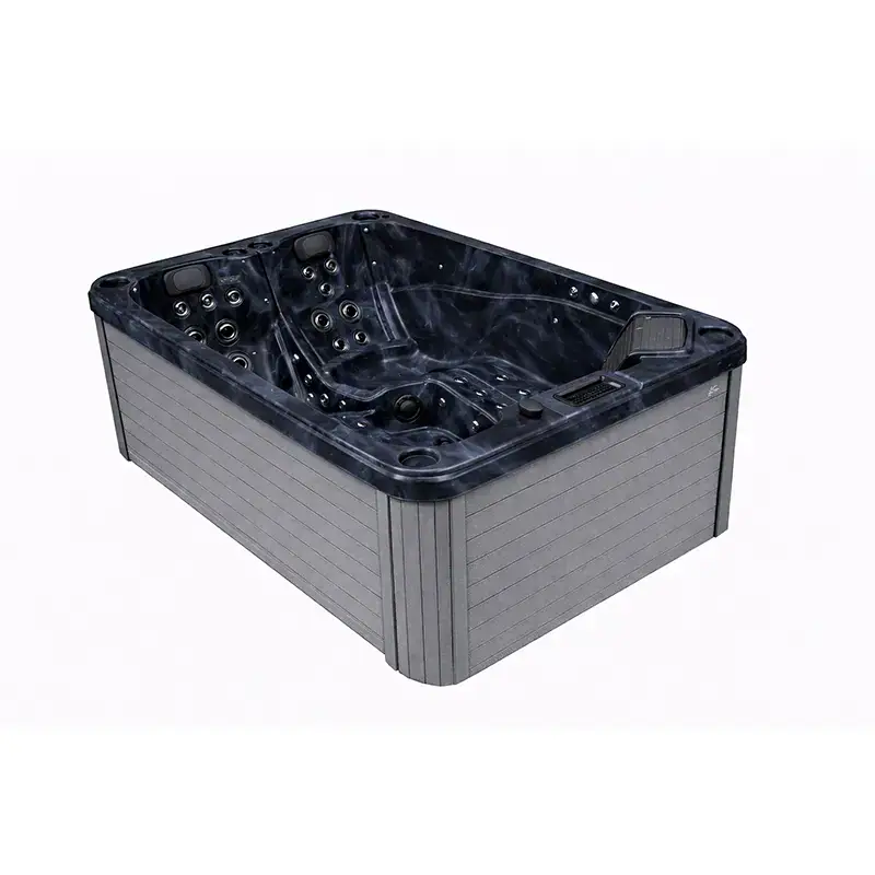 Vasca idromassaggio esterna in resina grigia Vasca idromassaggio esterna con sedili, getti d'acqua e luci LED, dimensioni compatte, ideale per wellness e relax in Ticino.